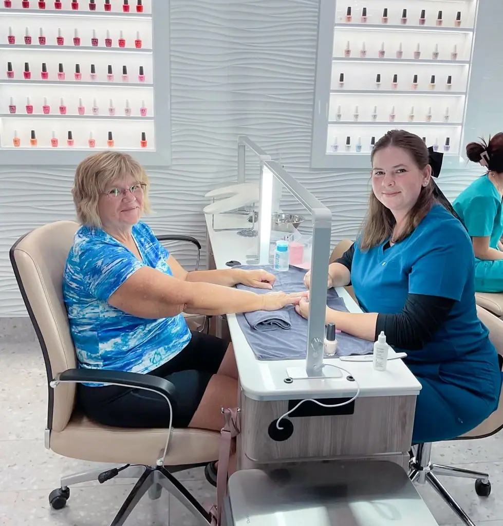Student performing spa services at IMAGE Institute